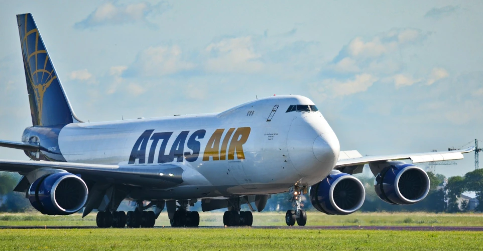 Large atlas air cargo plane on a runway.